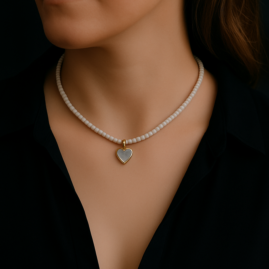 Bead necklace with a mother of pearl heart-shaped pendant on a mannequin on a women