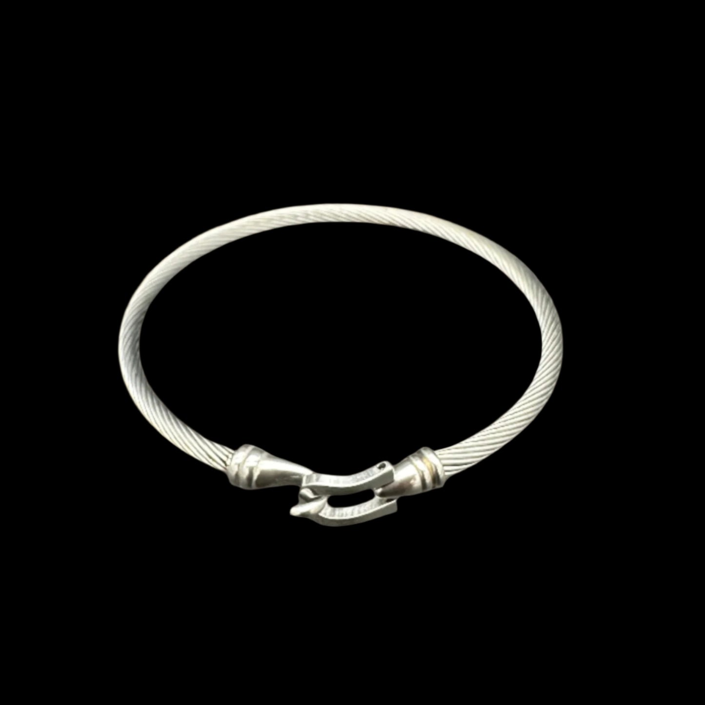 Silver bracelet on a dark gray background