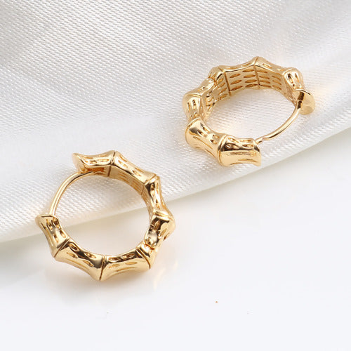 petite bamboo style earrings on white background