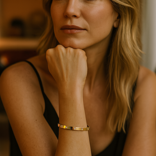 18K gold-plated crystal bangle bracelet with bezel-set stones, sleek polished design, tarnish-resistant and hypoallergenic.
