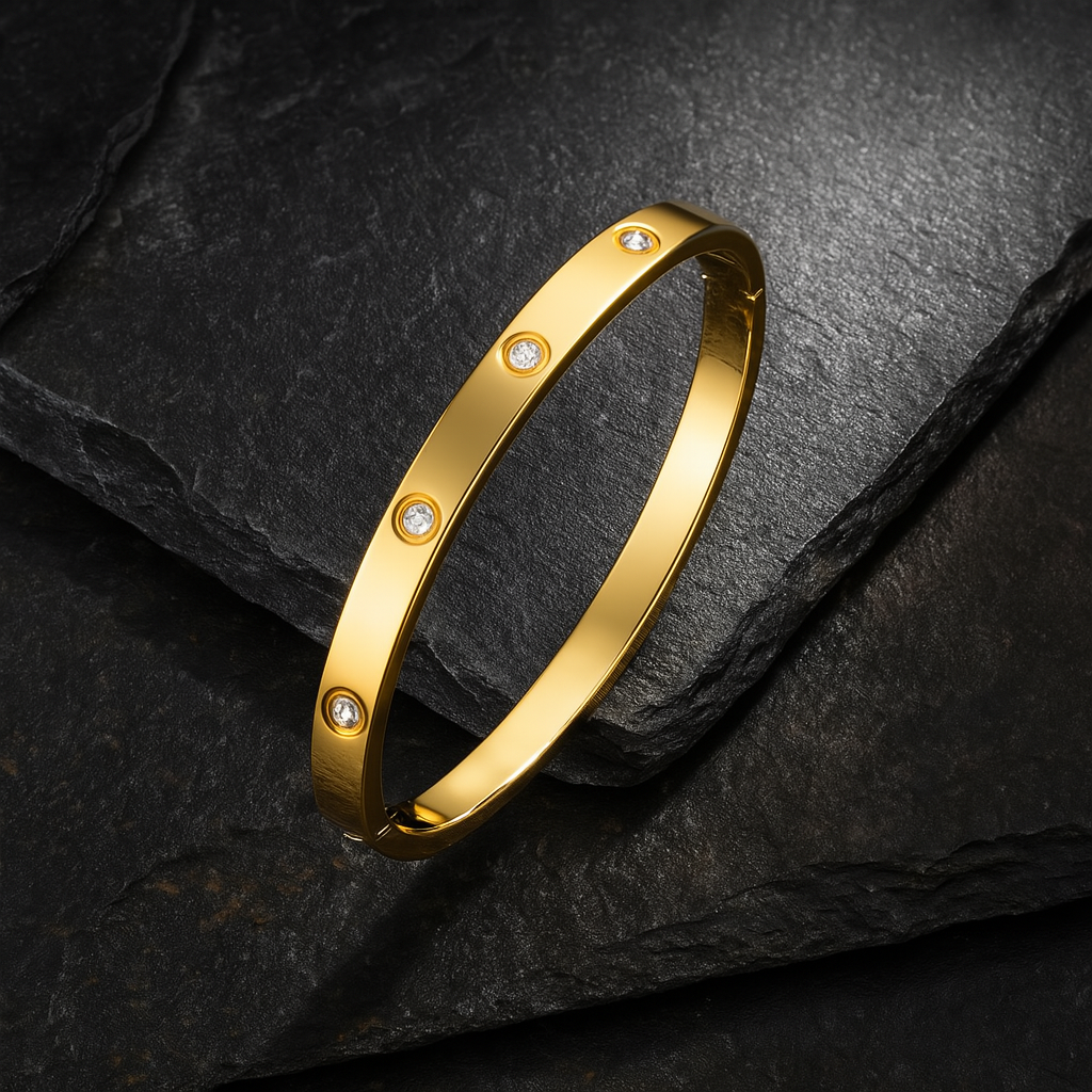 18K gold-plated crystal bangle bracelet with bezel-set stones, sleek polished design, tarnish-resistant and hypoallergenic.